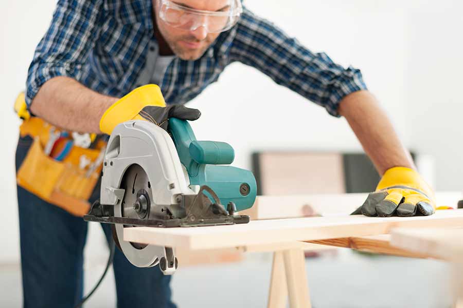 carpenter sawing